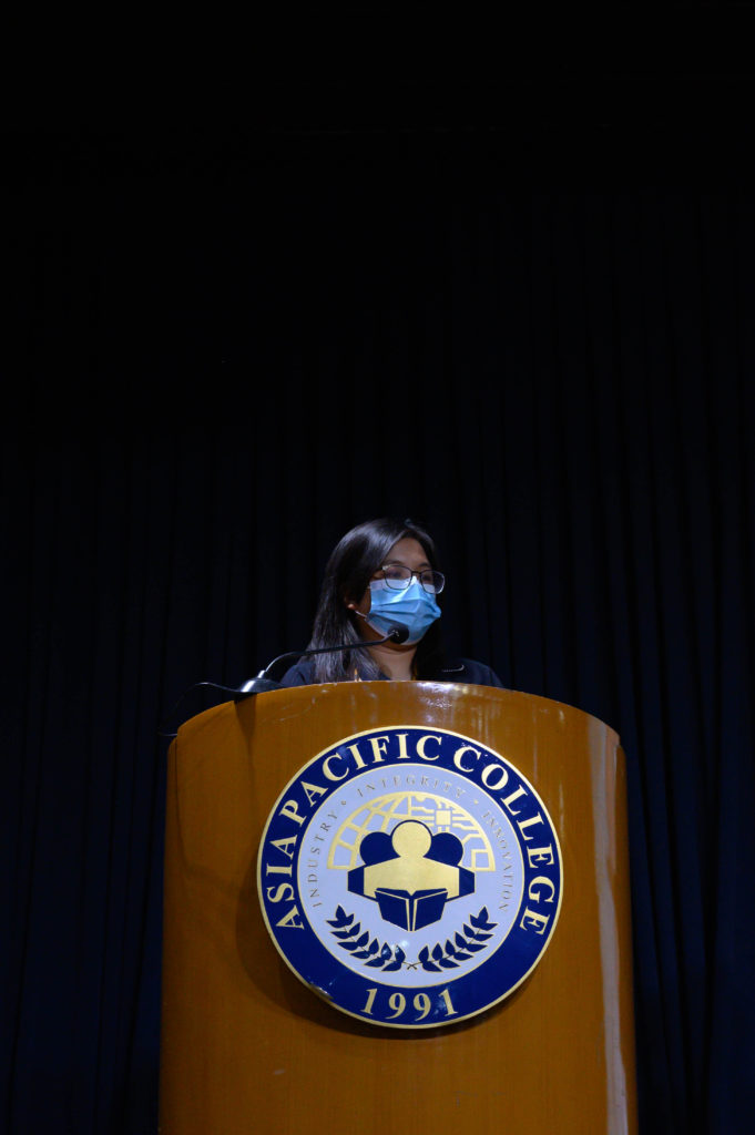 STEM Strand Head Geleena Gestiada announces the names of the academic excellence awardees. Photo by Terrence Luigi Matel